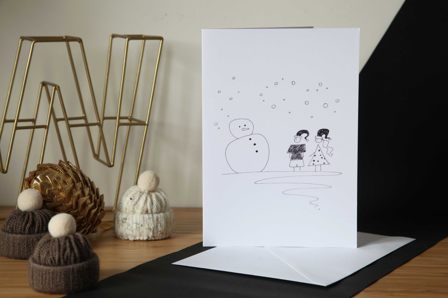 Christmas Card - Little Boy and Girl with a snowman